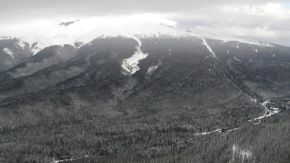 Snow-covered Mirror Lake and surrounding Mount Hood forest