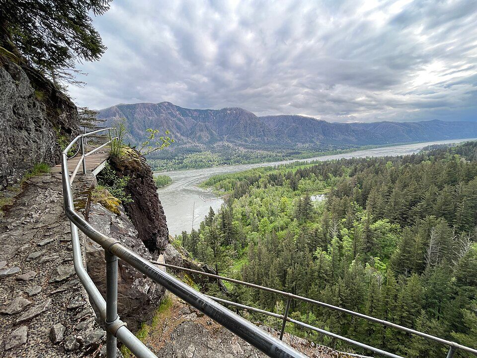Metal railings and exposed tread on Beacon Rock Trail above the Columbia River